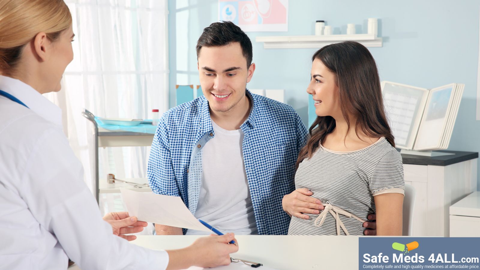 Pregnant couple visiting a doctors clinic to check sonogram