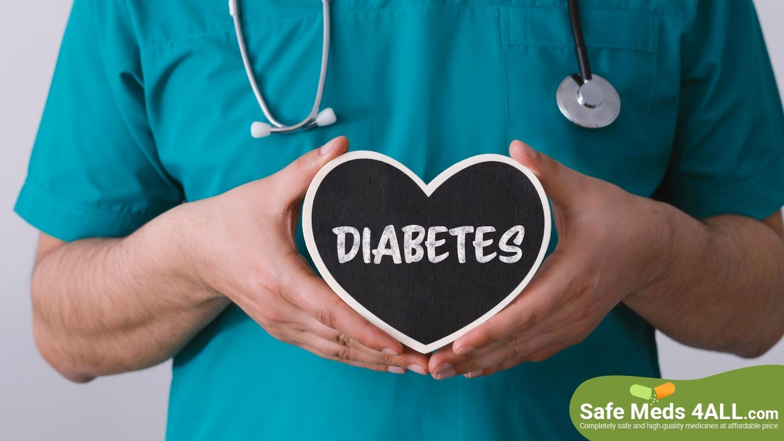 A health care provider holding a heart image with diabetes written on it