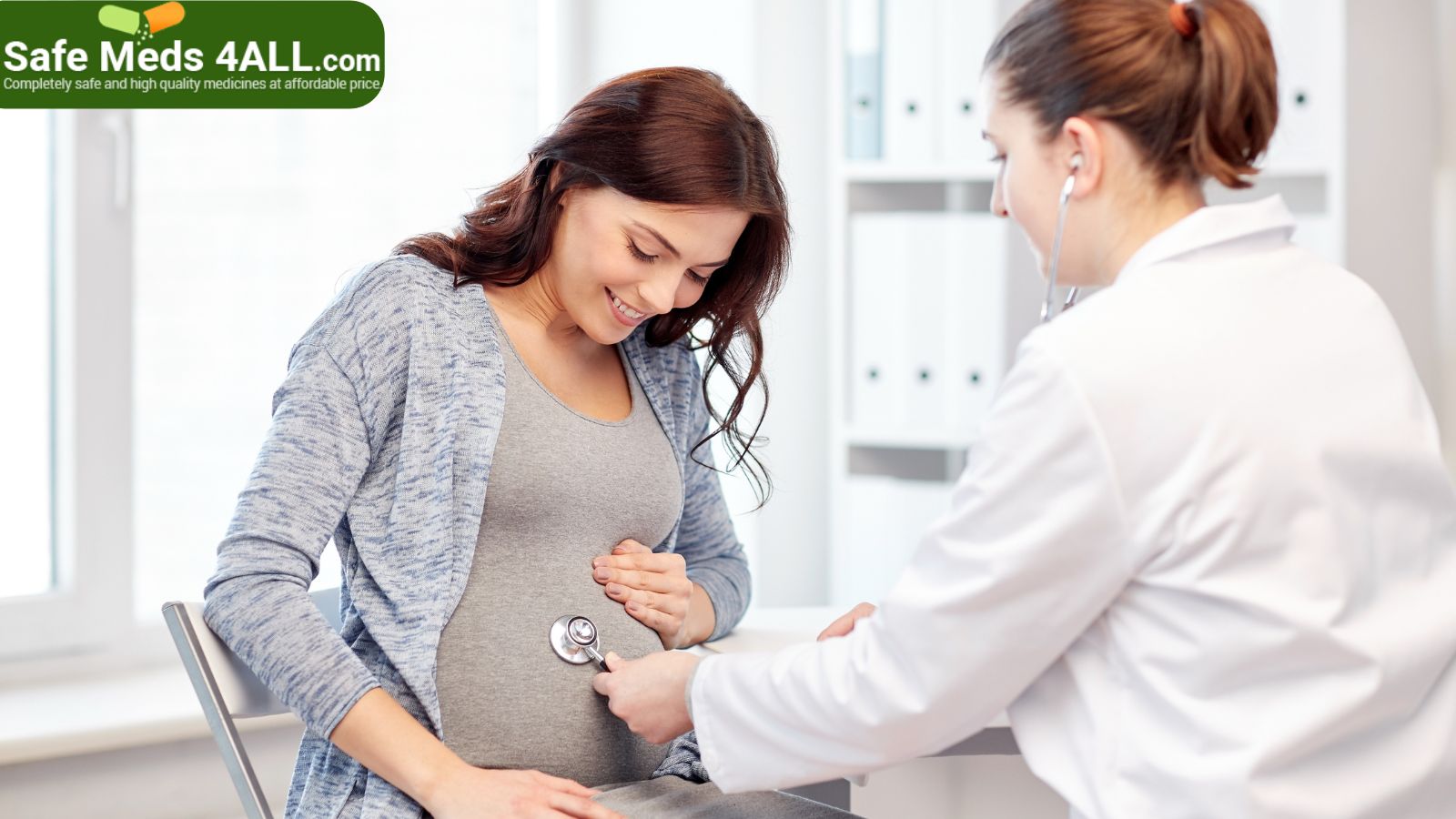 Doctor checking the belly of a pregnant woman with stethoscope