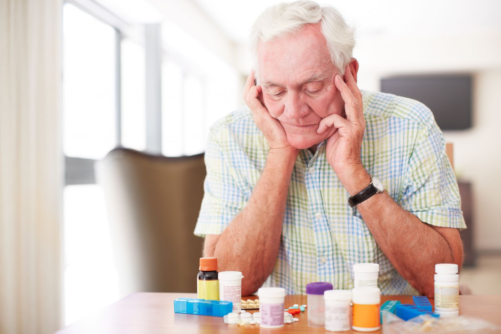 A man looking at his Erectile Dysfunction Drugs