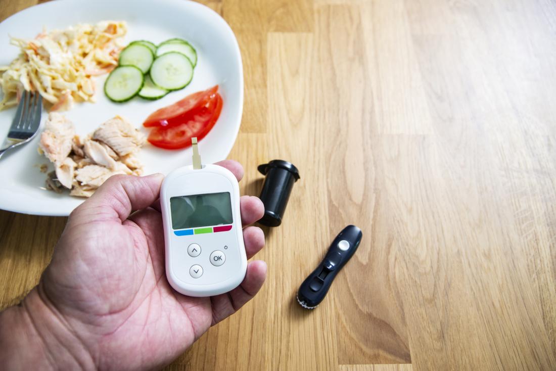 A person checking his blood sugar