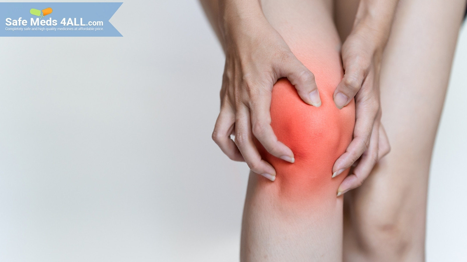 A person holding knee in pain.